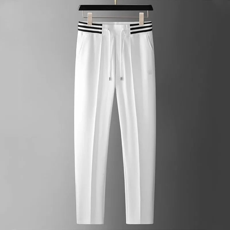 High end fashionable embroidered striped casual men's pants for the summer of 2024 new waffle ice silk comfortable sports pants